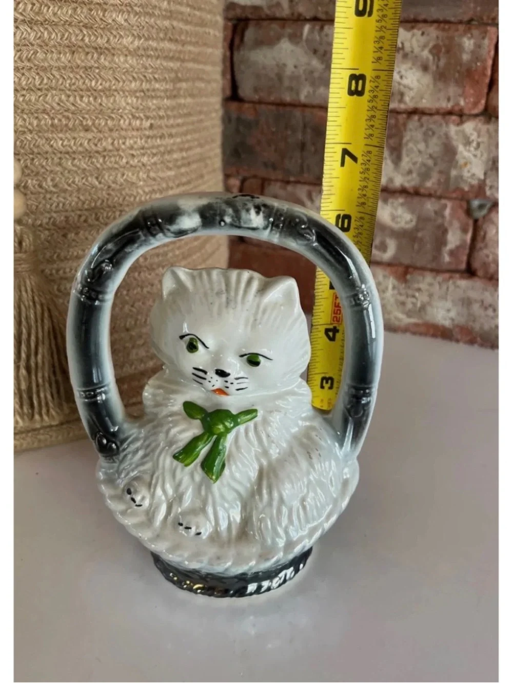 Vintage 1950’s Japan White Ceramic Cat Figurine with Green Bow and Silver Handle